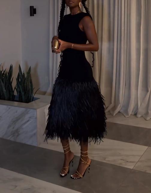 Sleeveless fringed midi dress